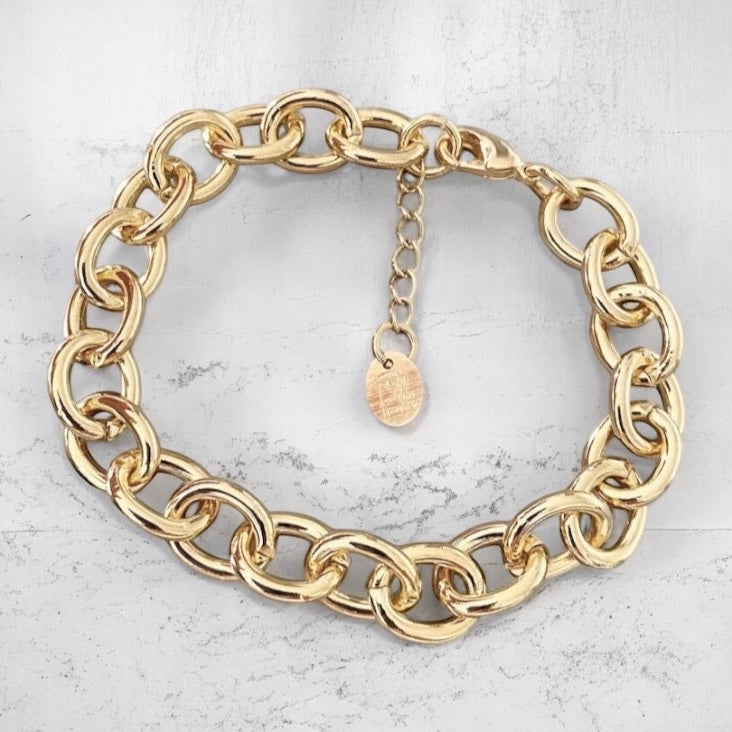 Pulsera monet gruesa oro