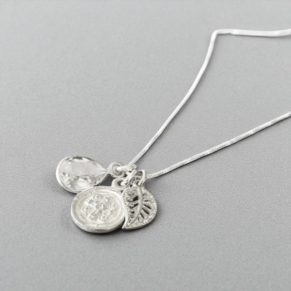 Collar trío hojita cruz plata 925