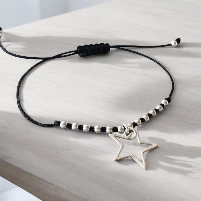 Pulsera hilo estrella plata