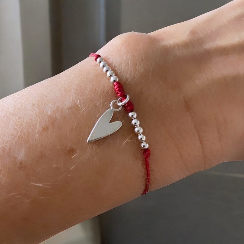 Pulsera hilo rojo corazón plata