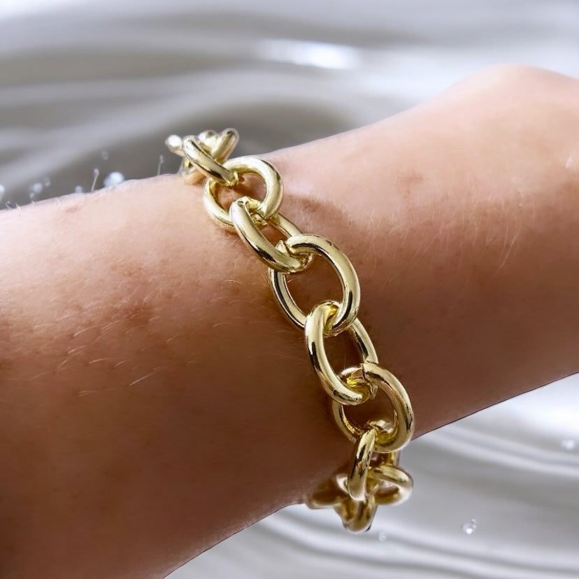Pulsera monet gruesa oro