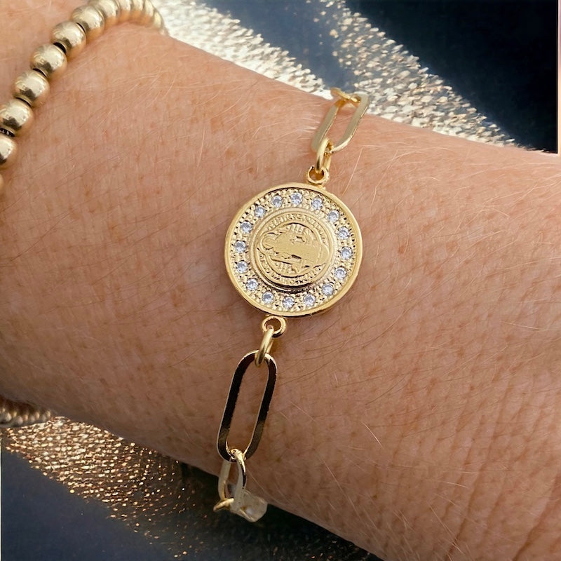 Pulsera eslabones san Benito circones oro
