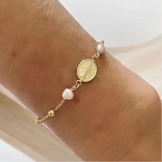 Pulsera bolitas perlas virgen oro