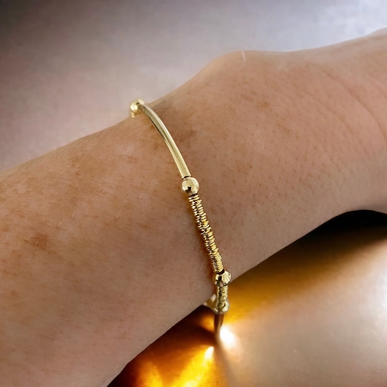 Pulsera mostacilla barrita oro