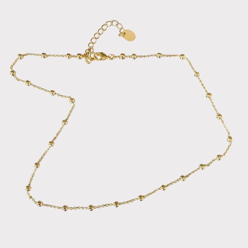 Collar bolitas oro