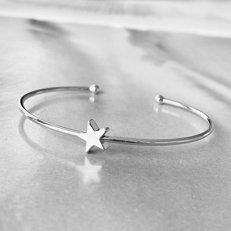 Esclava estrellita enchape oro blanco