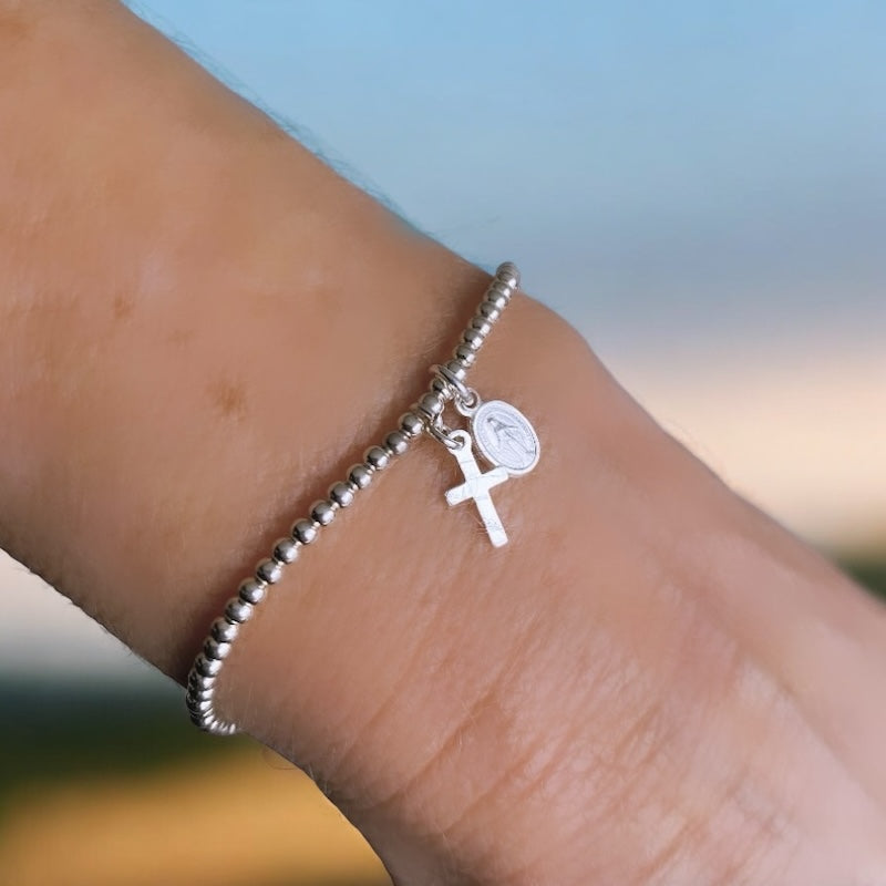 Pulsera mini virgen cruz plata