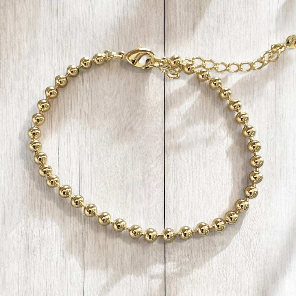 Pulsera luz broche oro