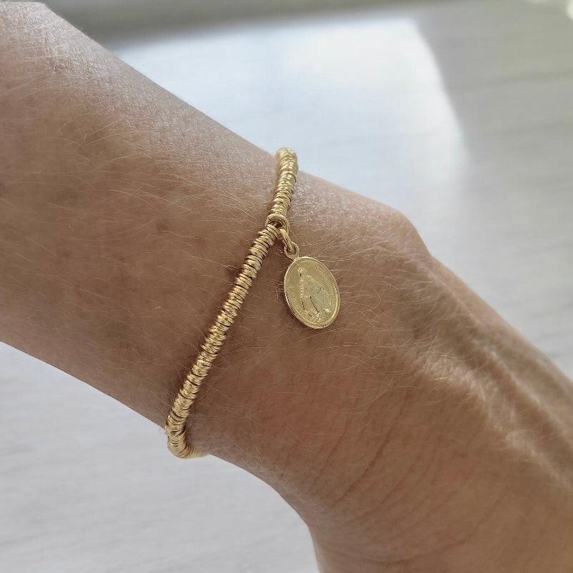 Pulsera mostacilla virgen de los rayos oro