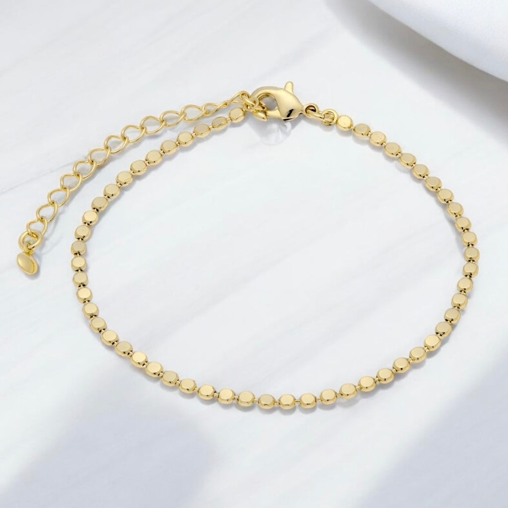 Pulsera bolitas planas oro
