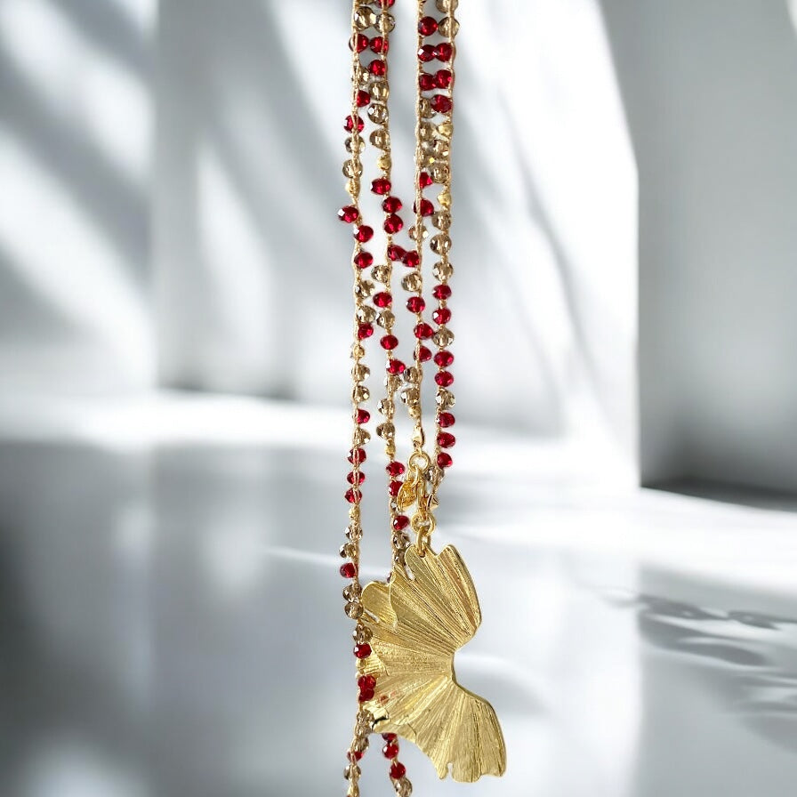 Collar largo tejido flor de mar oro