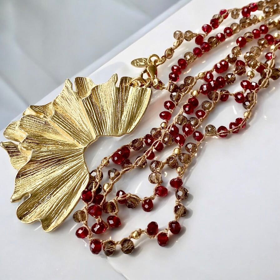 Collar largo tejido flor de mar oro