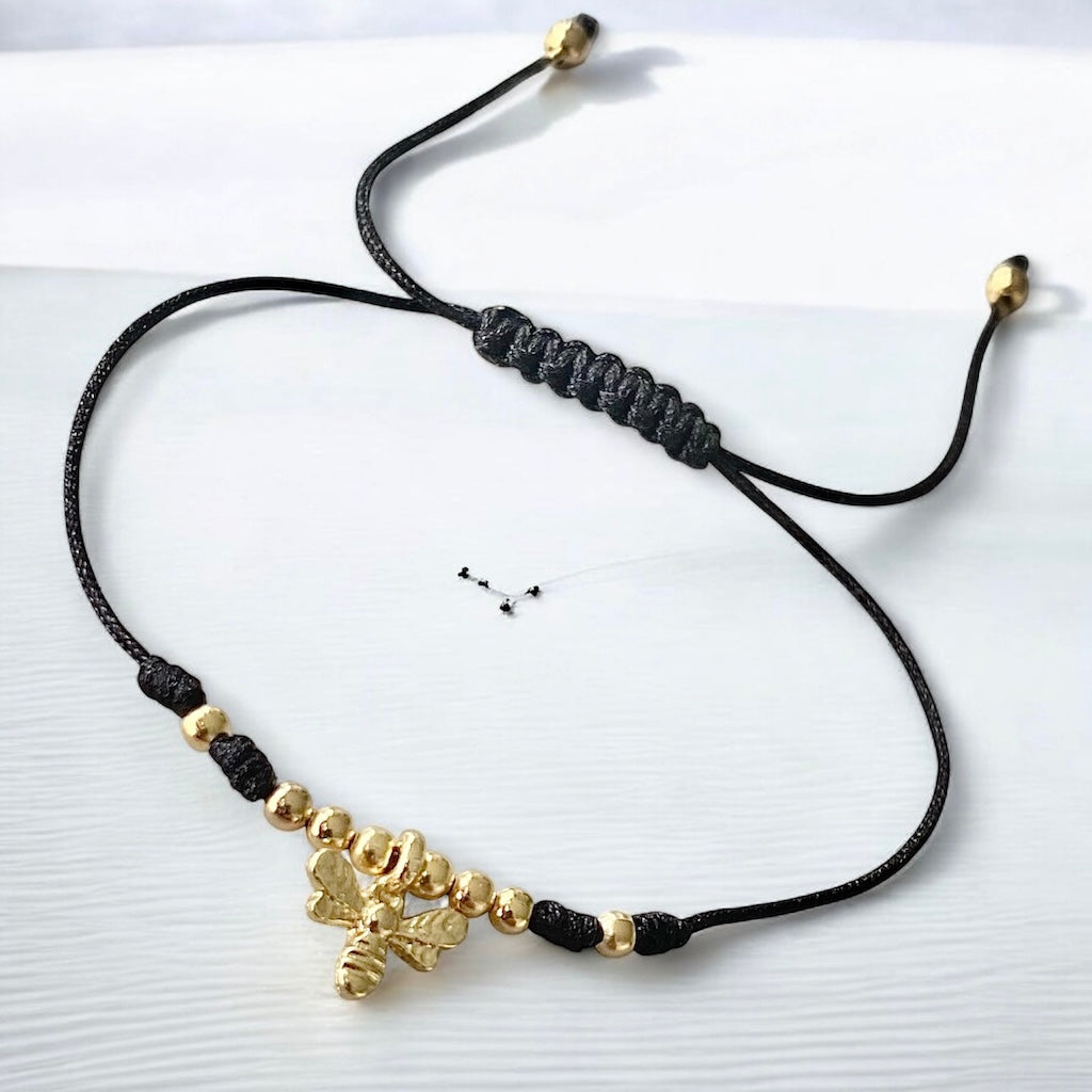 Pulsera hilo abejita oro