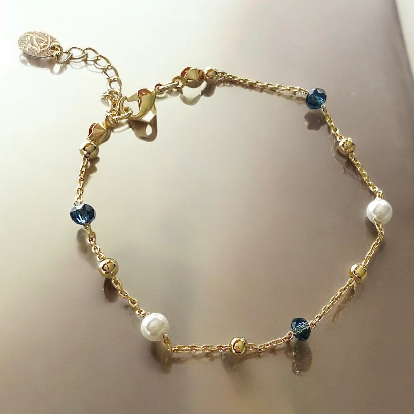 Pulsera bolitas perlas oro