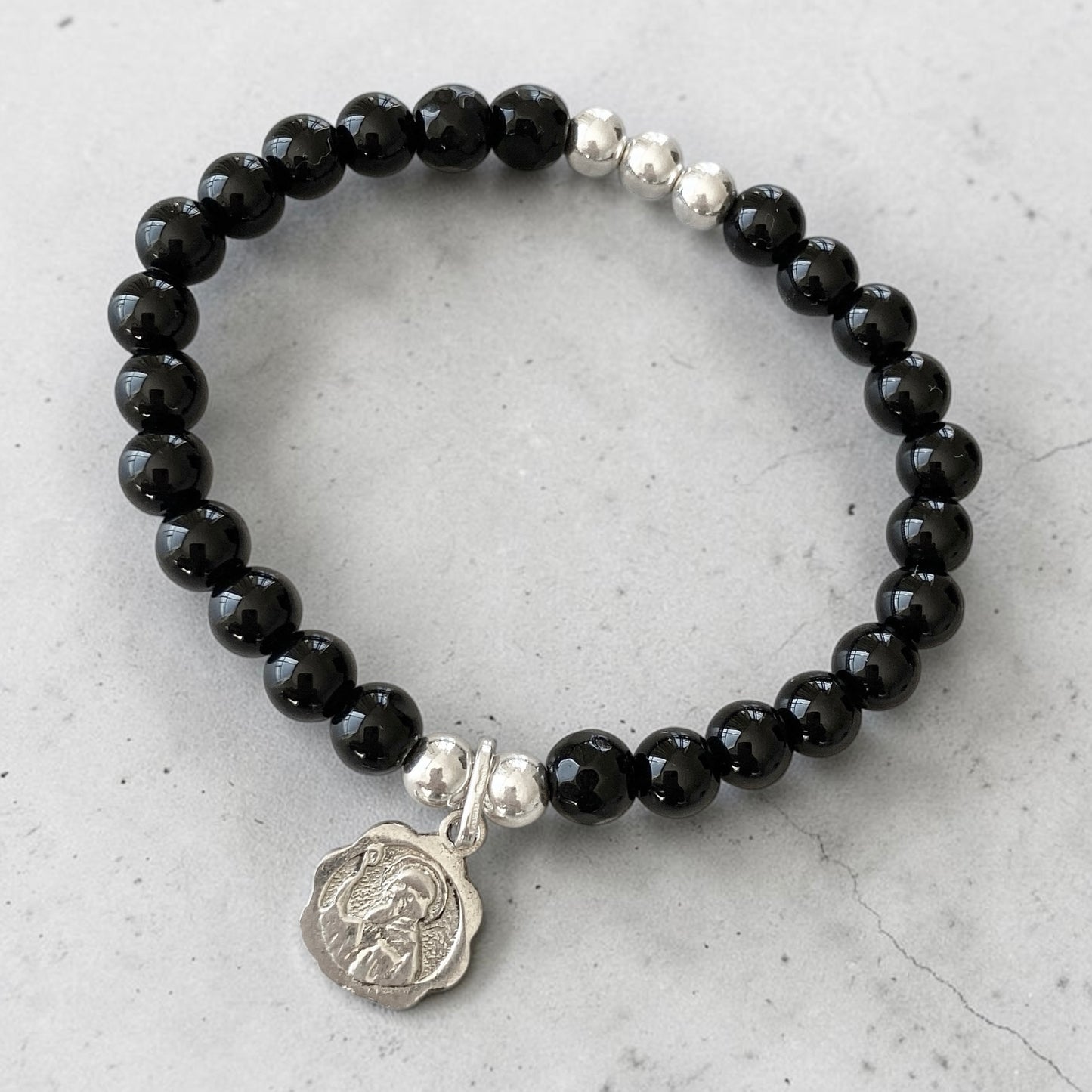 Pulsera ónix San Benito Abad plata