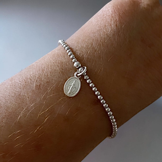 Pulsera bolitas mini virgen plata
