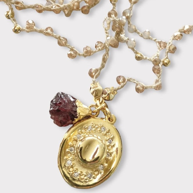 Collar doble tejido cristales champaña oro