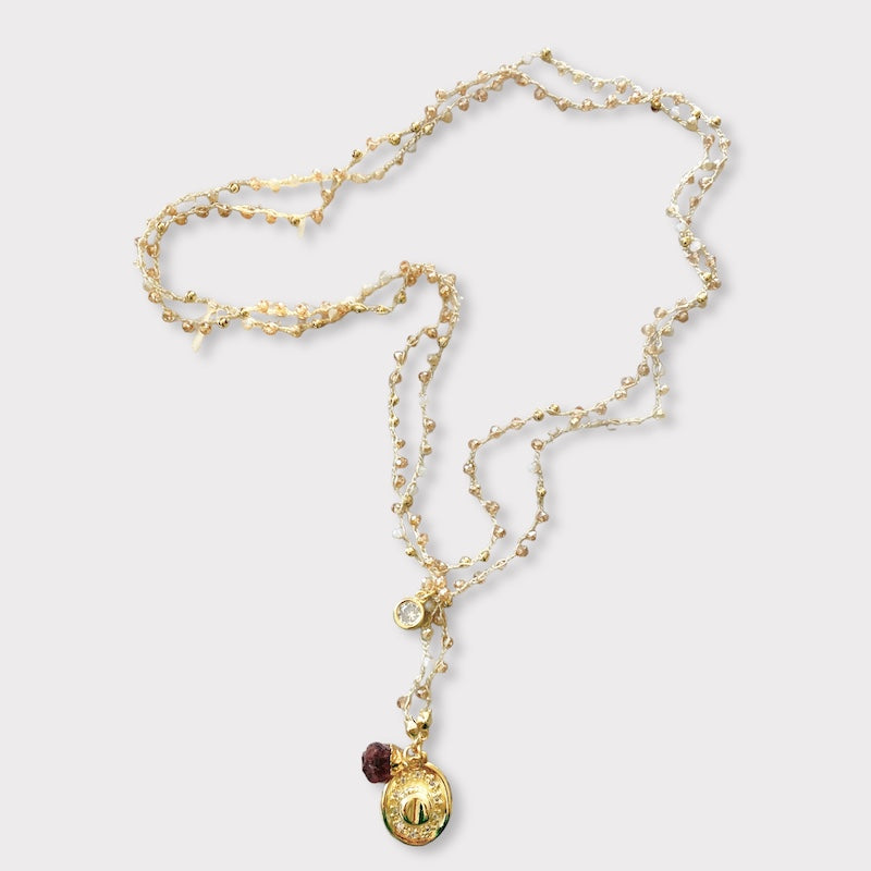 Collar doble tejido cristales champaña oro
