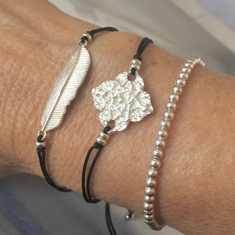 Pulsera hilo flor plata