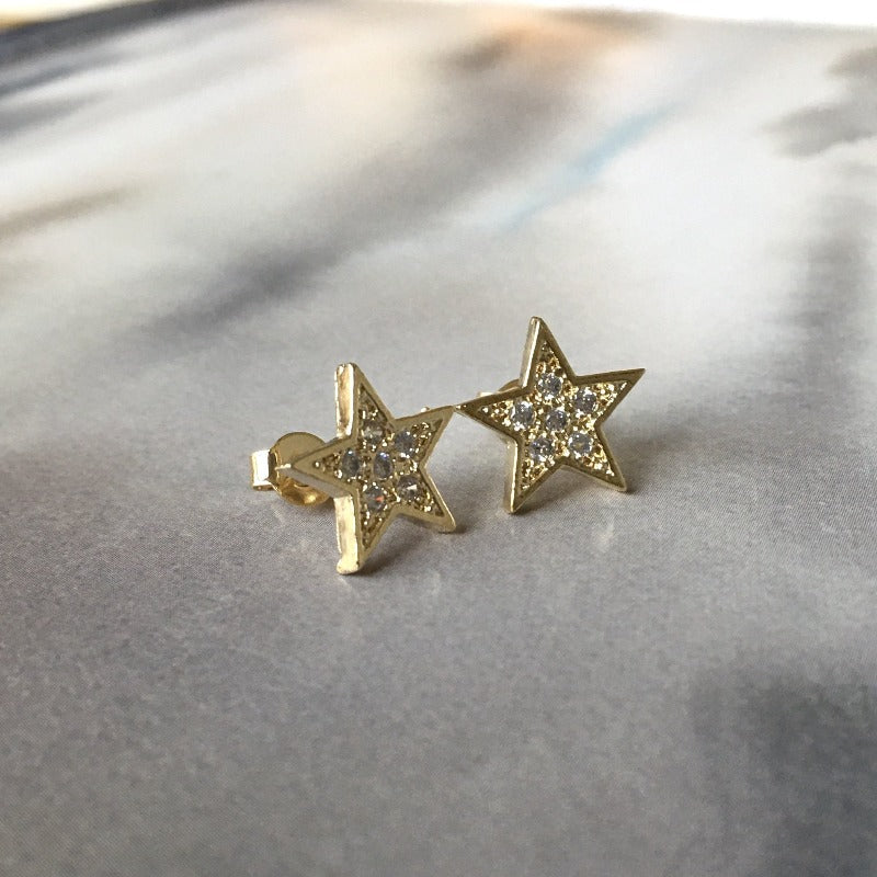 aros estrellas circones oro