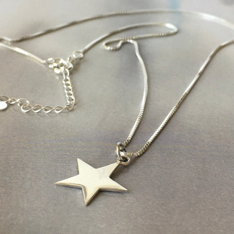 collar estrella plata
