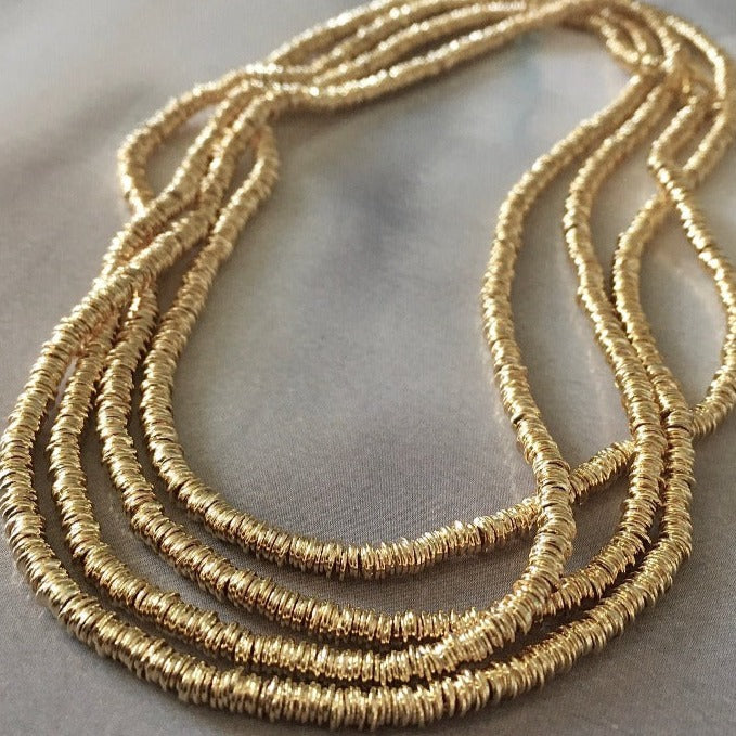 collar largo mostacilla argollita oro