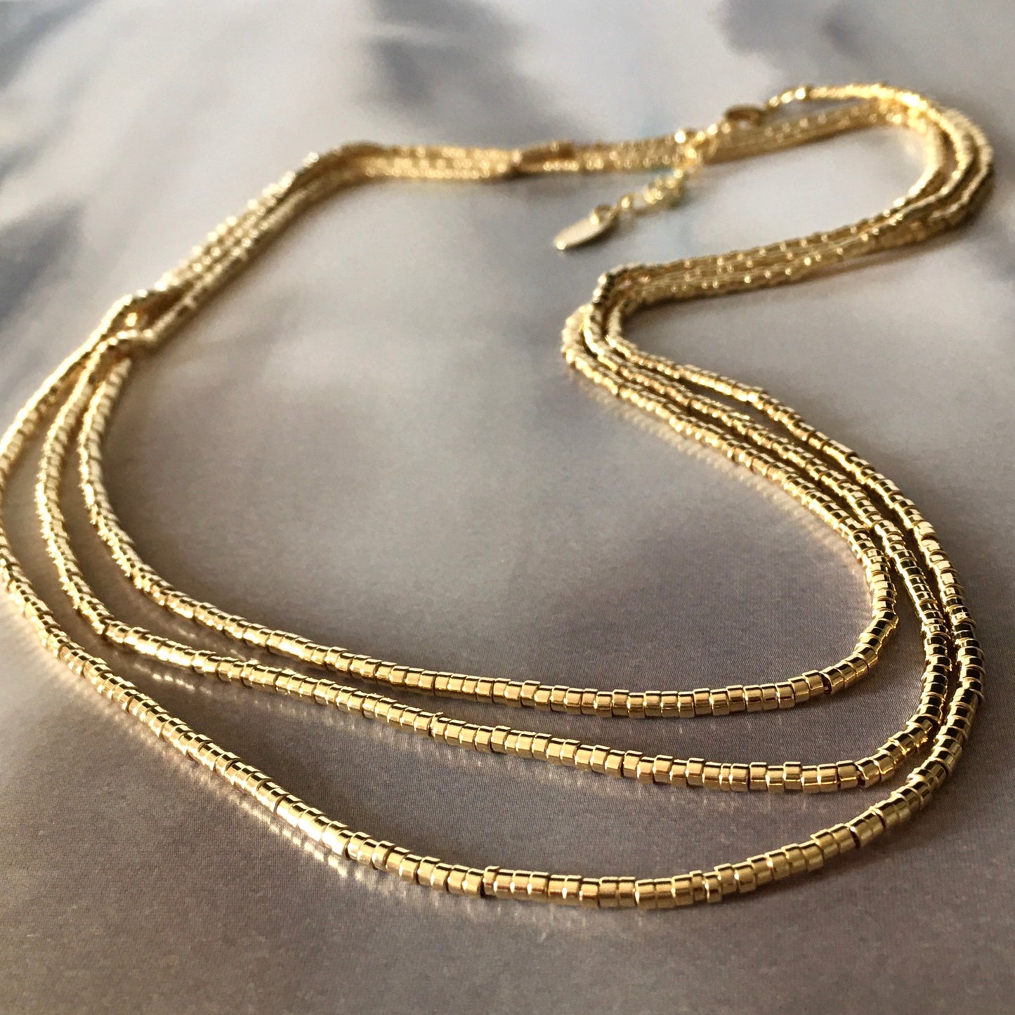 collar mostacillas 1,20m oro
