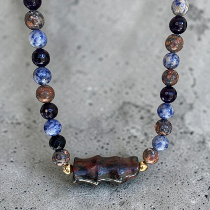 Collar tierra azul oro