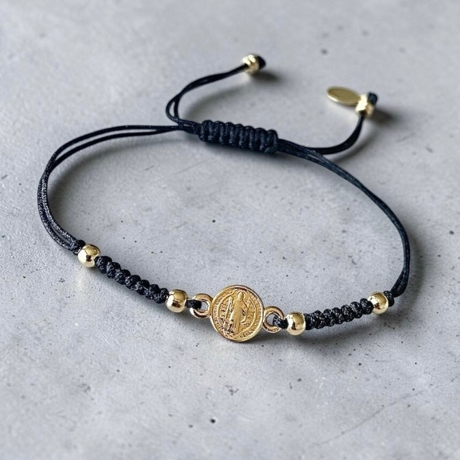 Pulsera hilo San Benito oro