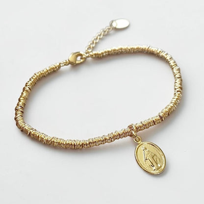 Pulsera mostacilla virgen de los rayos oro