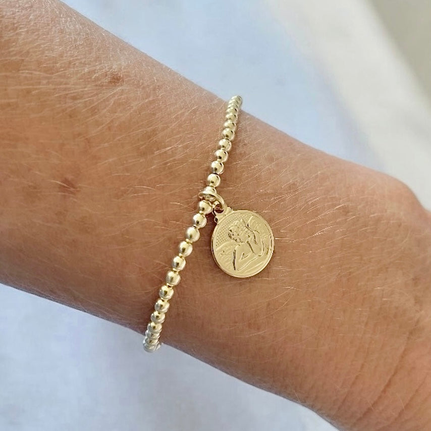 Pulsera bolitas ángel de la guarda oro