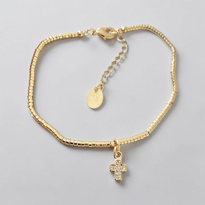 Pulsera lola mini cruz oro