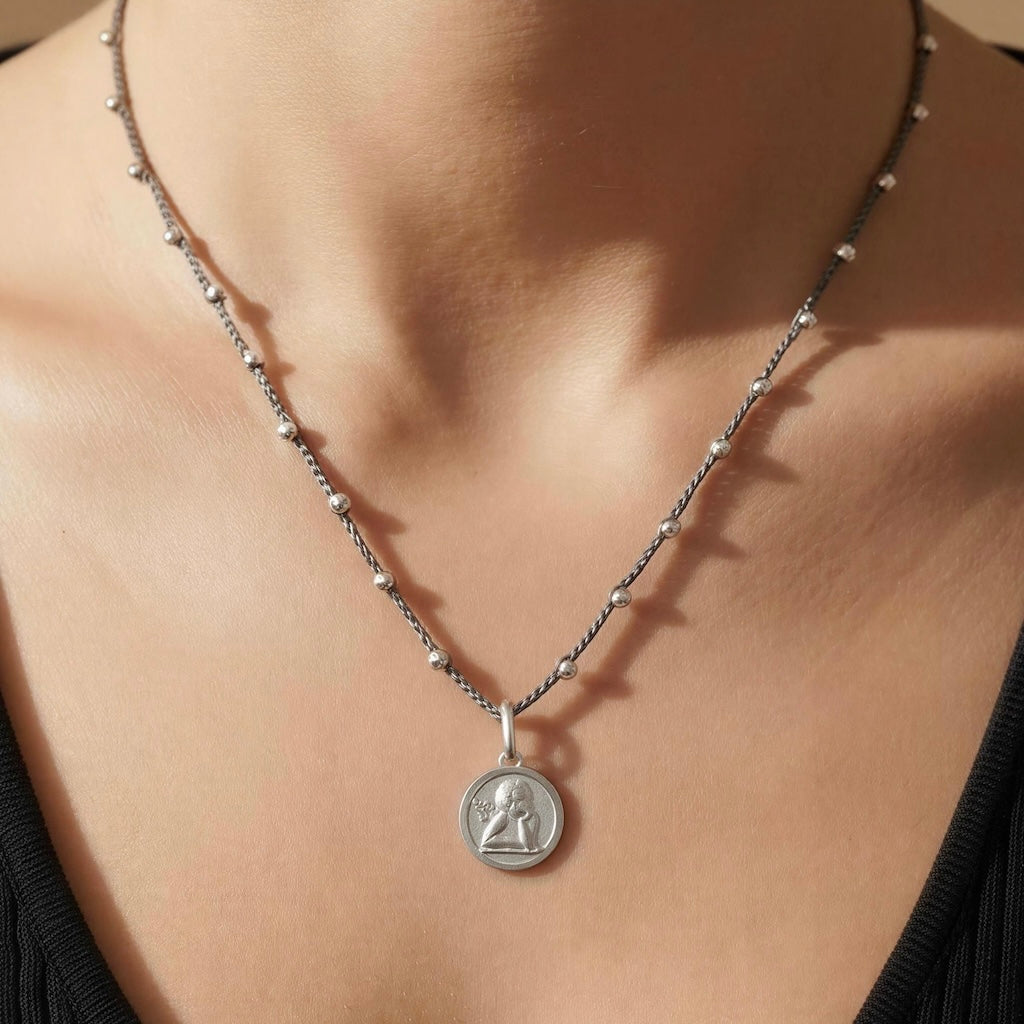 Collar tejido ángel de la guarda plata