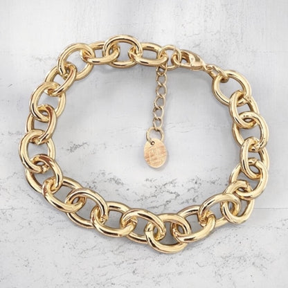 Pulsera monet gruesa oro