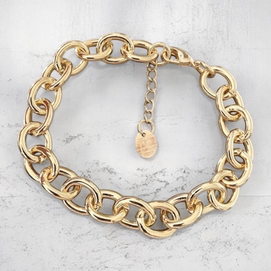 Pulsera monet gruesa oro