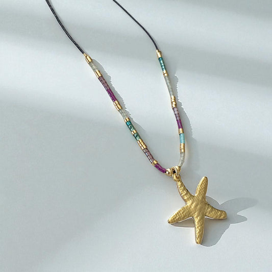 Collar hilo estrella de mar oro