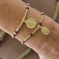 Pulsera mostacilla granate oro