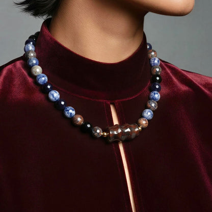 Collar tierra azul oro