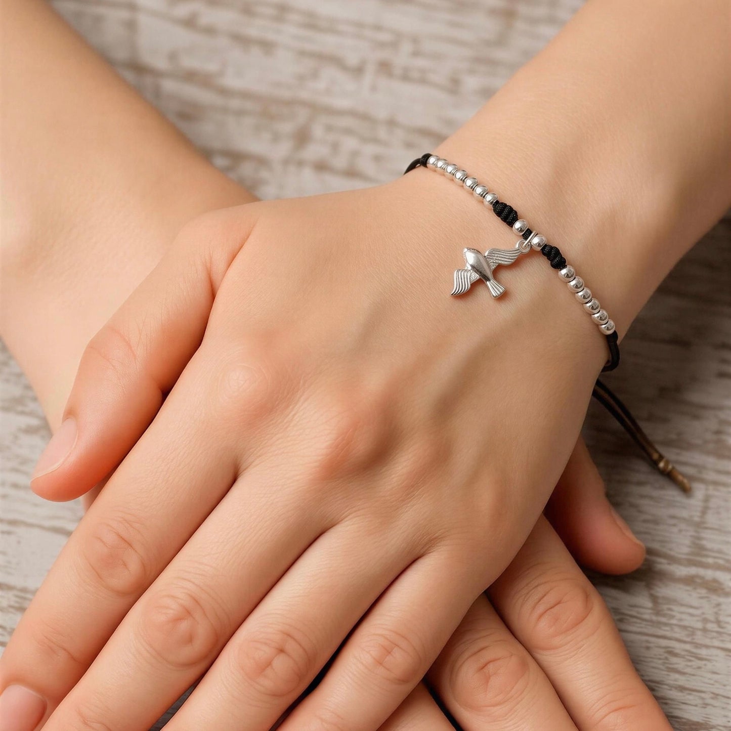 Pulsera hilo Espíritu Santo plata
