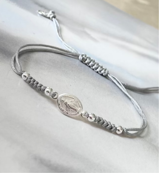 Pulsera hilo virgen de los rayos plata
