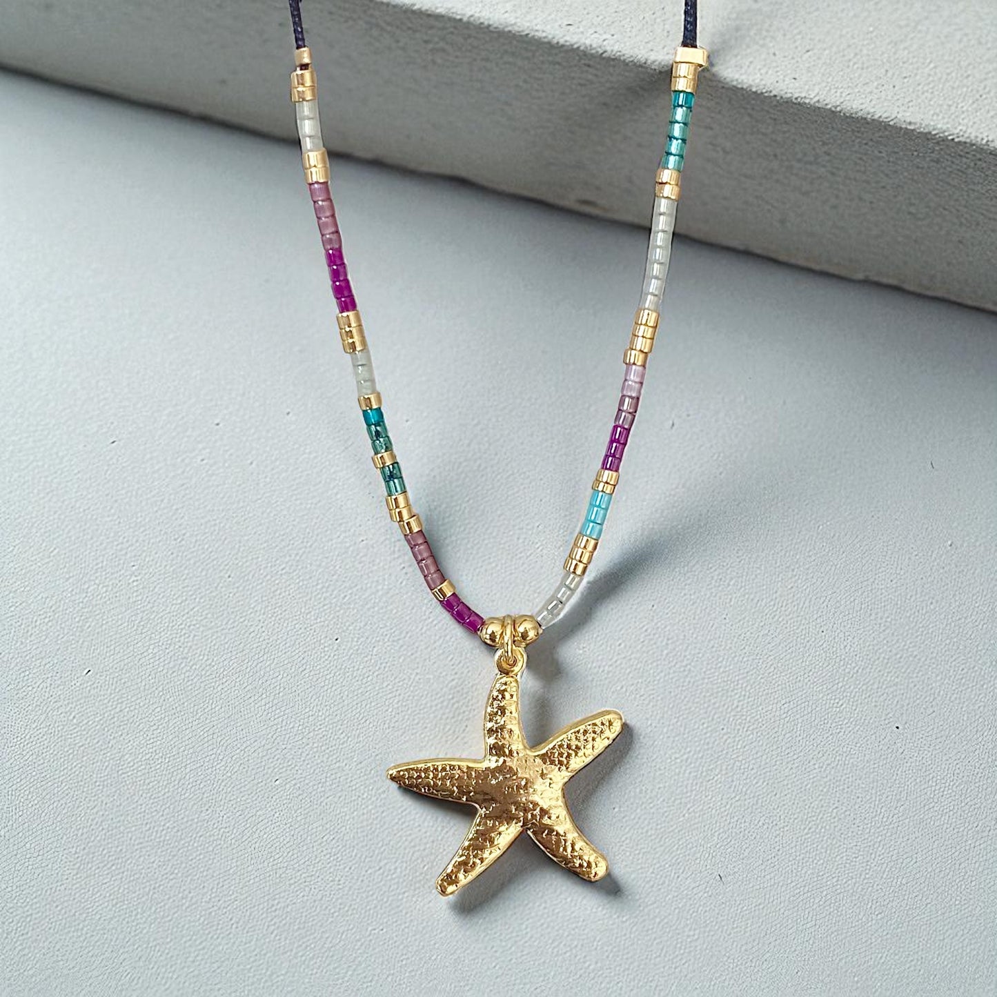 Collar hilo estrella de mar oro
