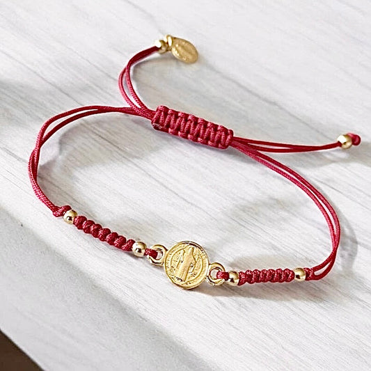 Pulsera hilo San Benito oro