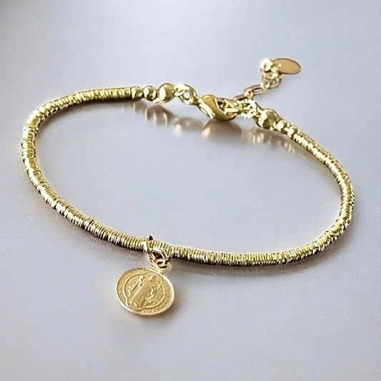 Pulsera mostacillas san benito oro