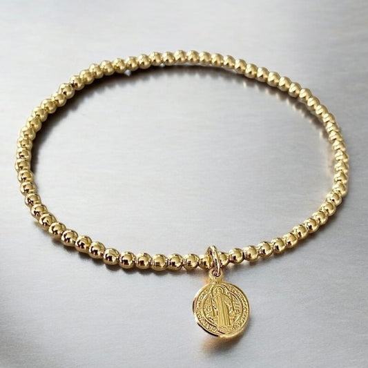 Pulsera bolitas san Benito oro