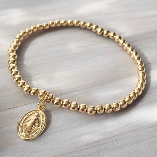 Pulsera medalla oro