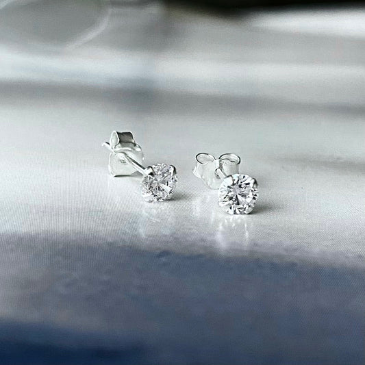 Aros mini punto de luz plata 925