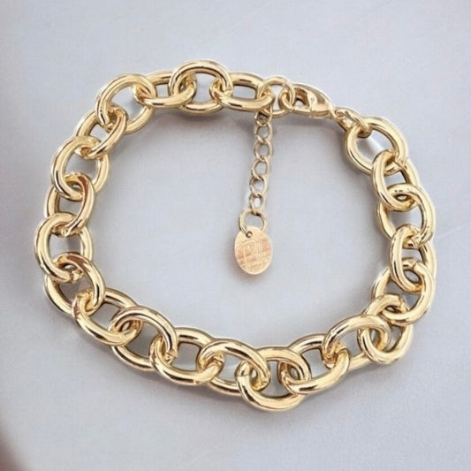 Pulsera monet gruesa oro