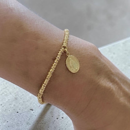 Pulsera mostacilla virgen de los rayos oro
