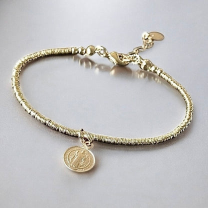 Pulsera mostacillas san benito oro