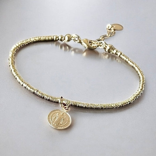 Pulsera mostacillas san benito oro